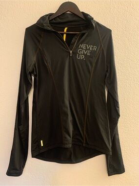 Lolë Black Hooded Pullover “Never Give Up”